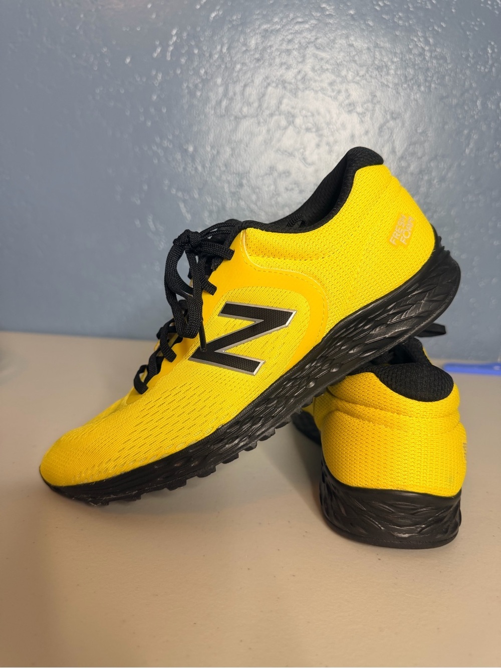 New Balance Fresh Foam Arishi v2 running shoes yellow and black youth size 7